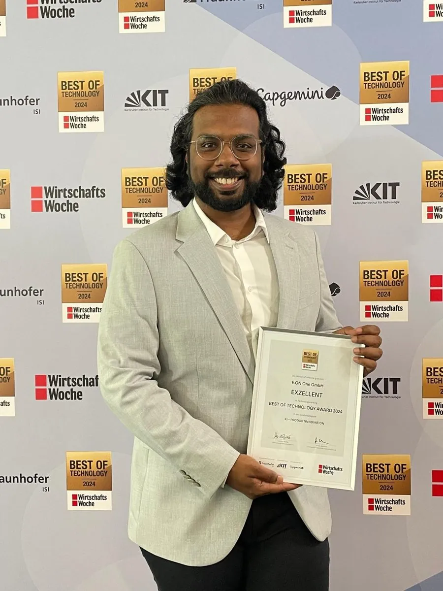 Anand Narasipuram holding the Best of Technology Award 2024 certificate from E.ON One GmbH.