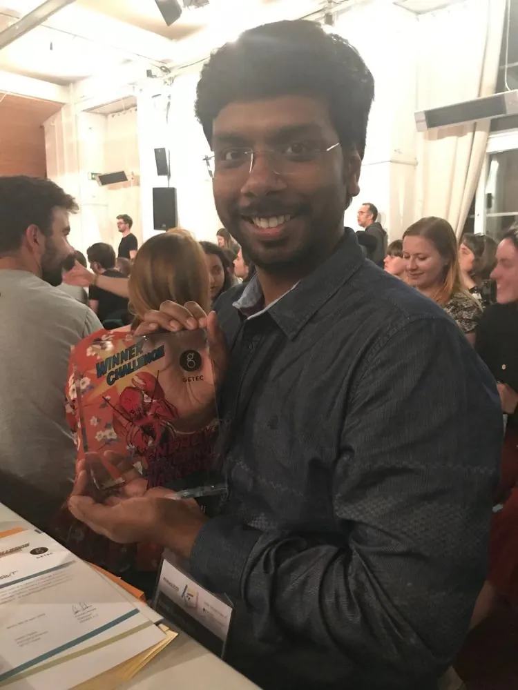 Anand Narasipuram holding the Winner Challenge trophy of the Energy Efficiency Hack 2019, sponsored by GETEC.